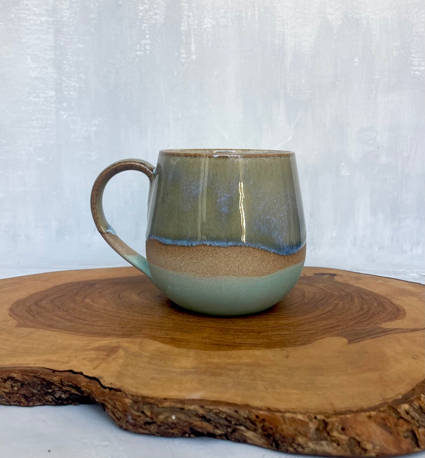 Set of Four Turquoise Sea Waves Mugs on Sand Clay